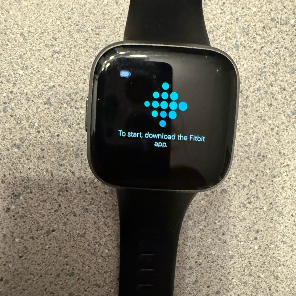 Fitbit Smartwatch with extra bands and accessories